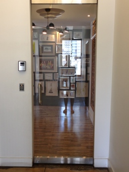The Office entry-way is lined with gorgeous fashion illustrations